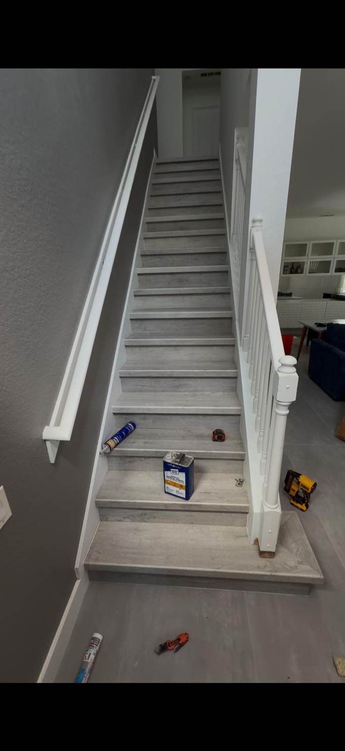 Staircase with new gray stair treads